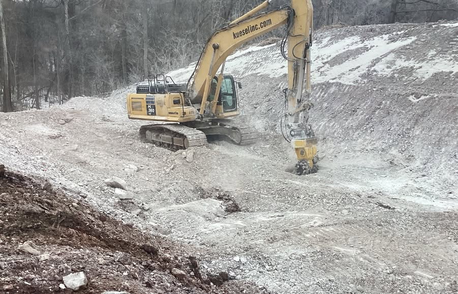 Structural demolition with hydraulic hammer attachment