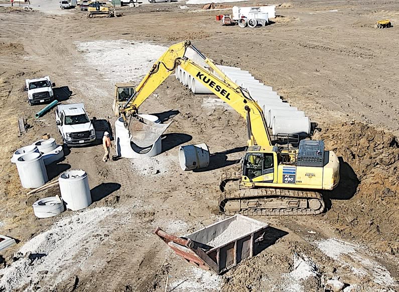 Water & Sewer Infrastructure — Underground utility construction — water lines, sanitary sewer, storm sewer, and manholes for municipal and private site work.